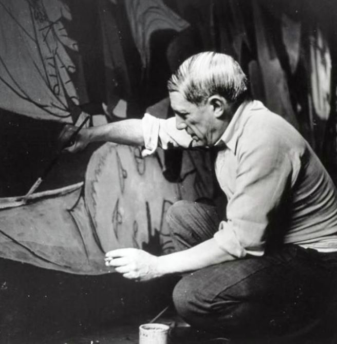 Picasso is photographed, Painting Guernica, Using media and materials to convey the effect of people's suffering. 
